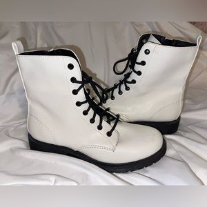 White and Black combat boots